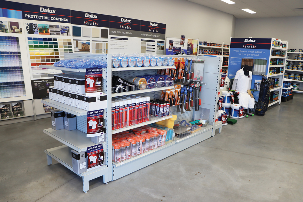 Dulux retail store aisle shelving in grey