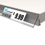 Angled data shelf strip label for gondola shelving shelves