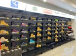 Black slatwall retail wall shelving shoe display